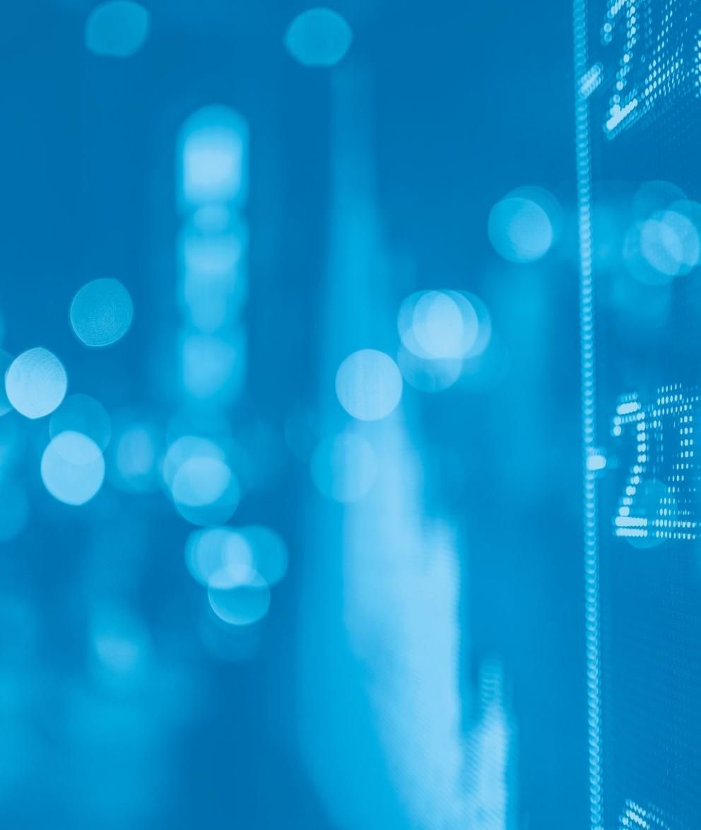 Stock image featuring blur of financial numbers on a blue background