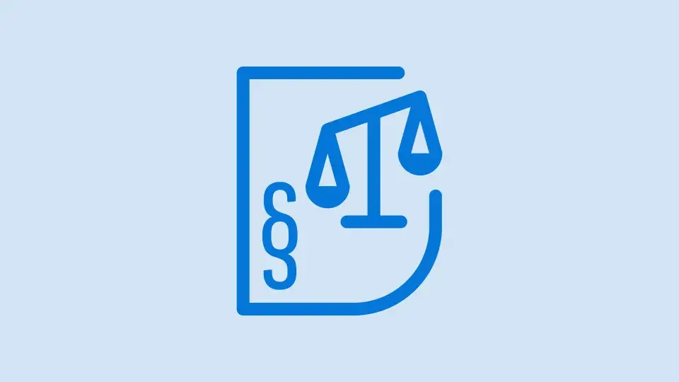 Blue icon of a legal document with paragraph symbol and balanced scales, representing legal compliance